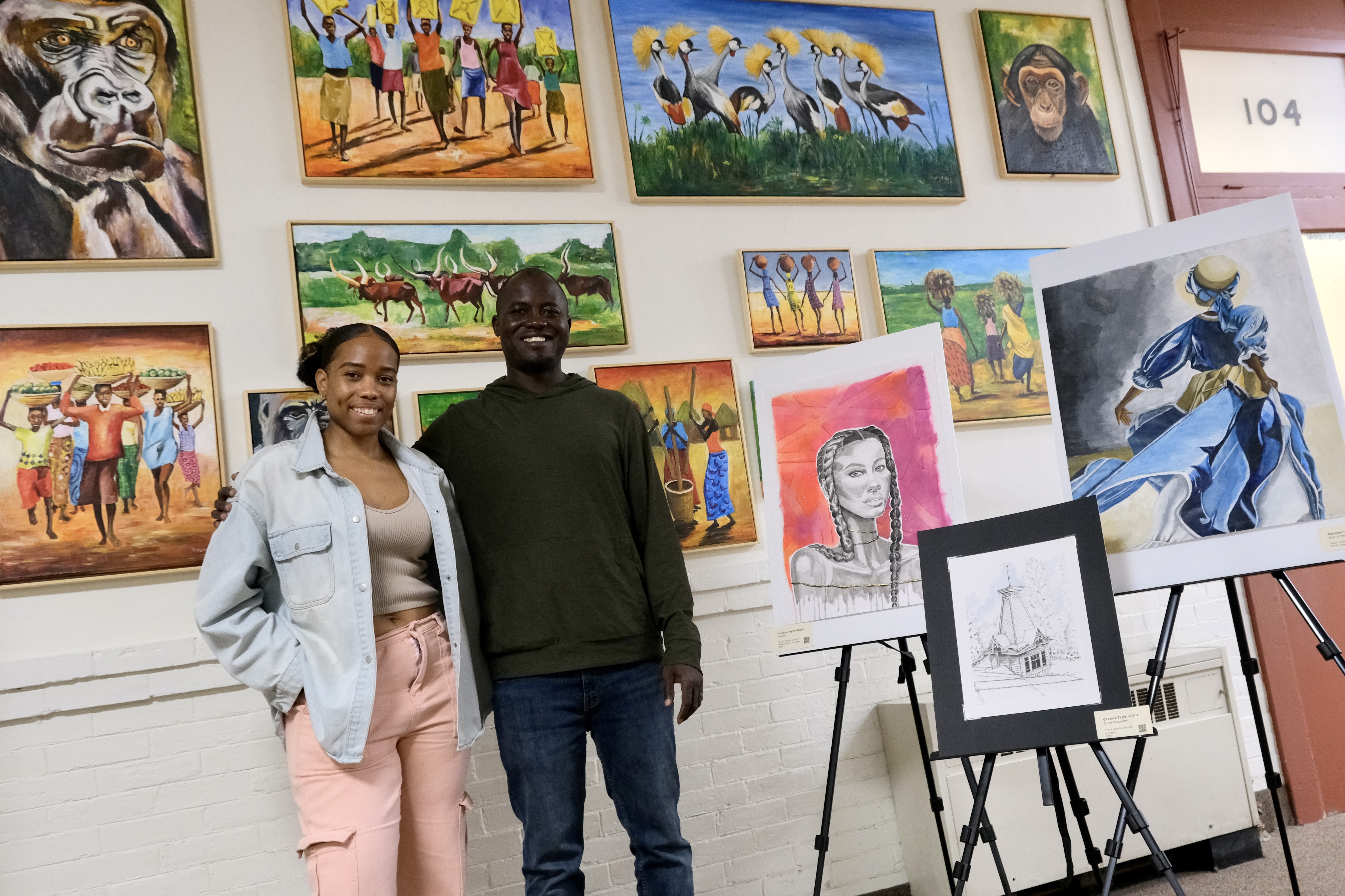 A photo of the featured artists and their work on display during the 3rd annual Juneteenth Art Show.